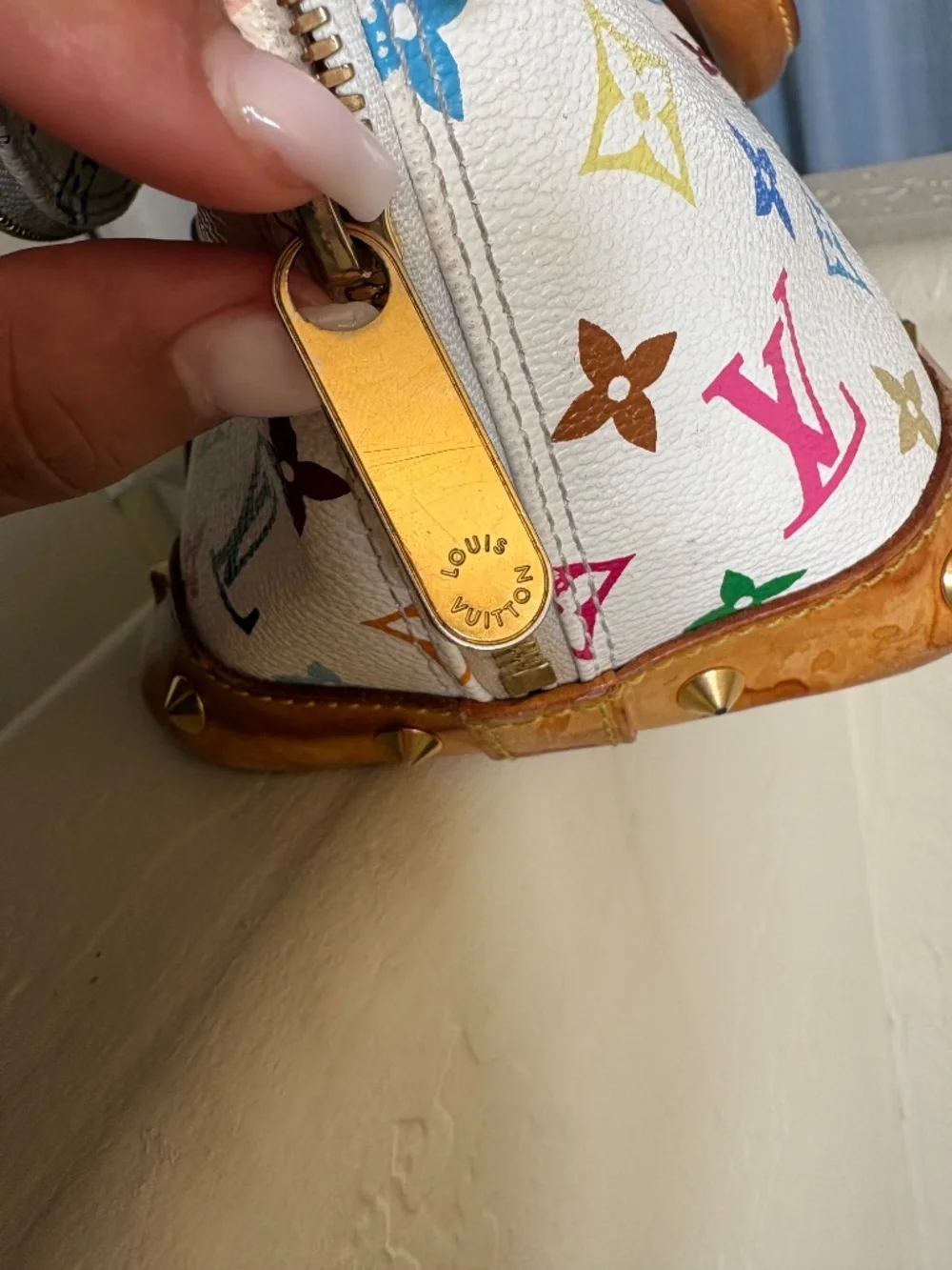 Louis Vuitton monogram alma white